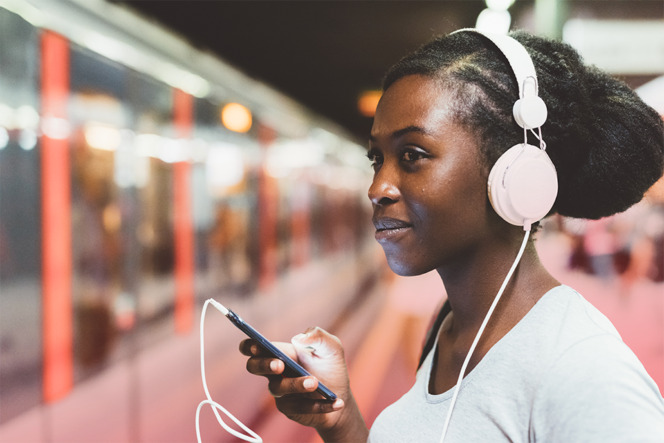 young-woman-travelling-subway-using-smartphone-2024-10-18-06-43-49-utc