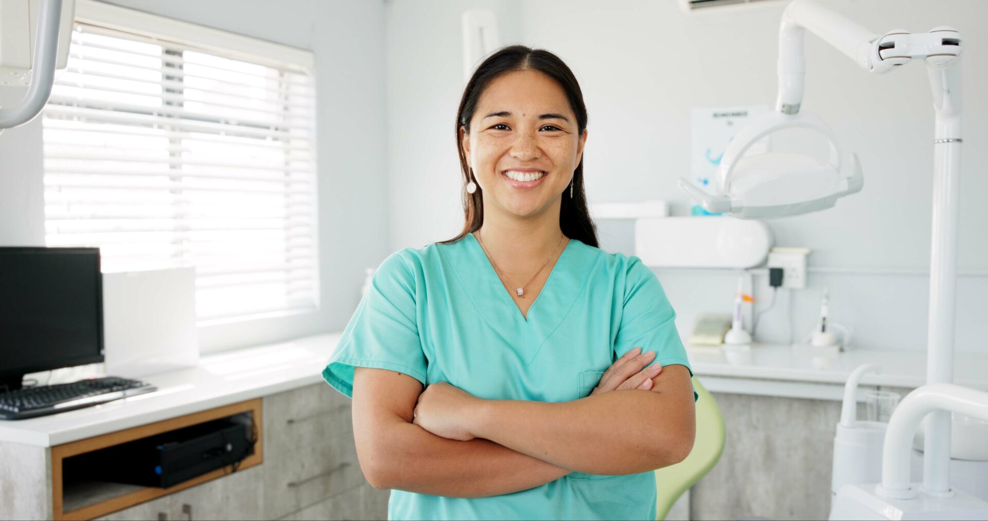 friendly-dental-professional-smiling-in-clinic-set-2026-09-24-13-19-33-utc